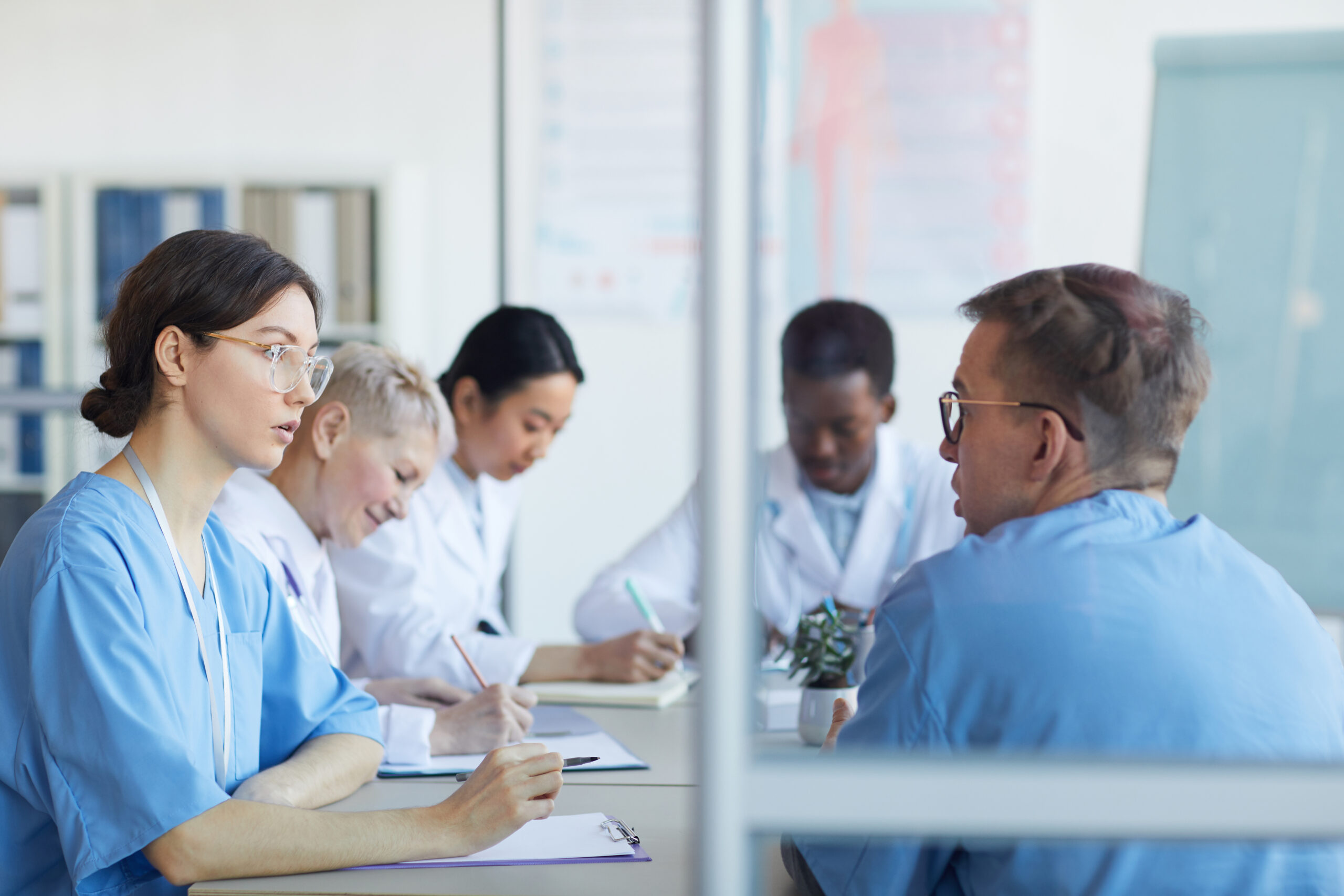Team of clinicians at meeting